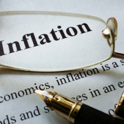 inflation_paper with word inflation and glasses. economic concept_canstockphoto39514246